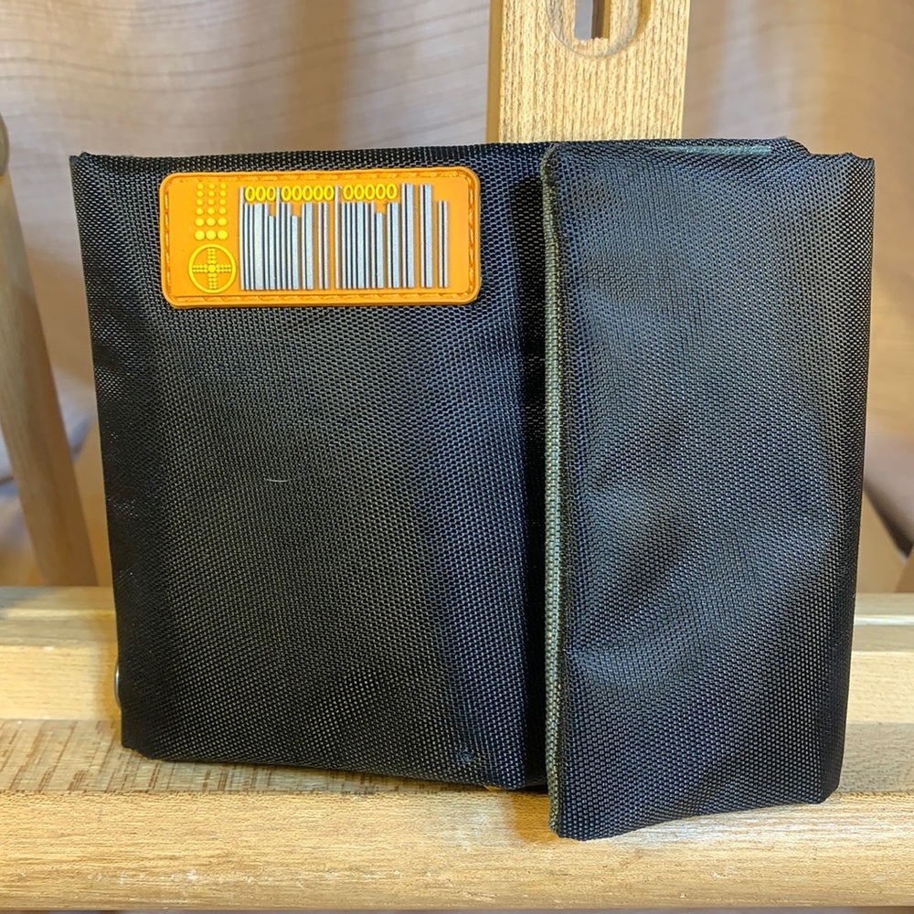 NWOT SurPlus foldable wallet w/bungee leash